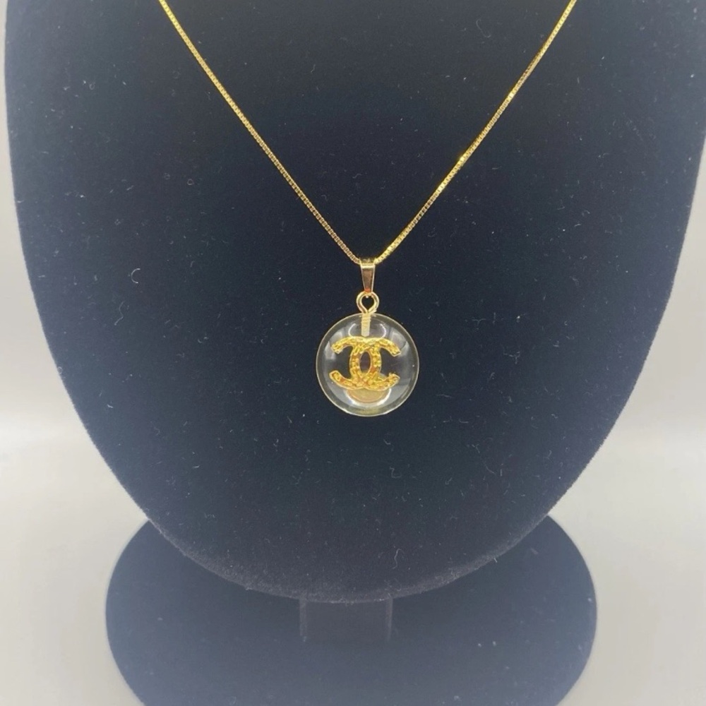 Authentic Chanel Charm on 18” necklace